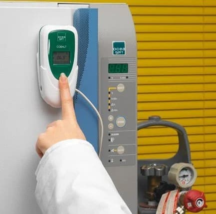 Dickson Cobalt data logger mounted on laboratory incubator for continuous temperature monitoring