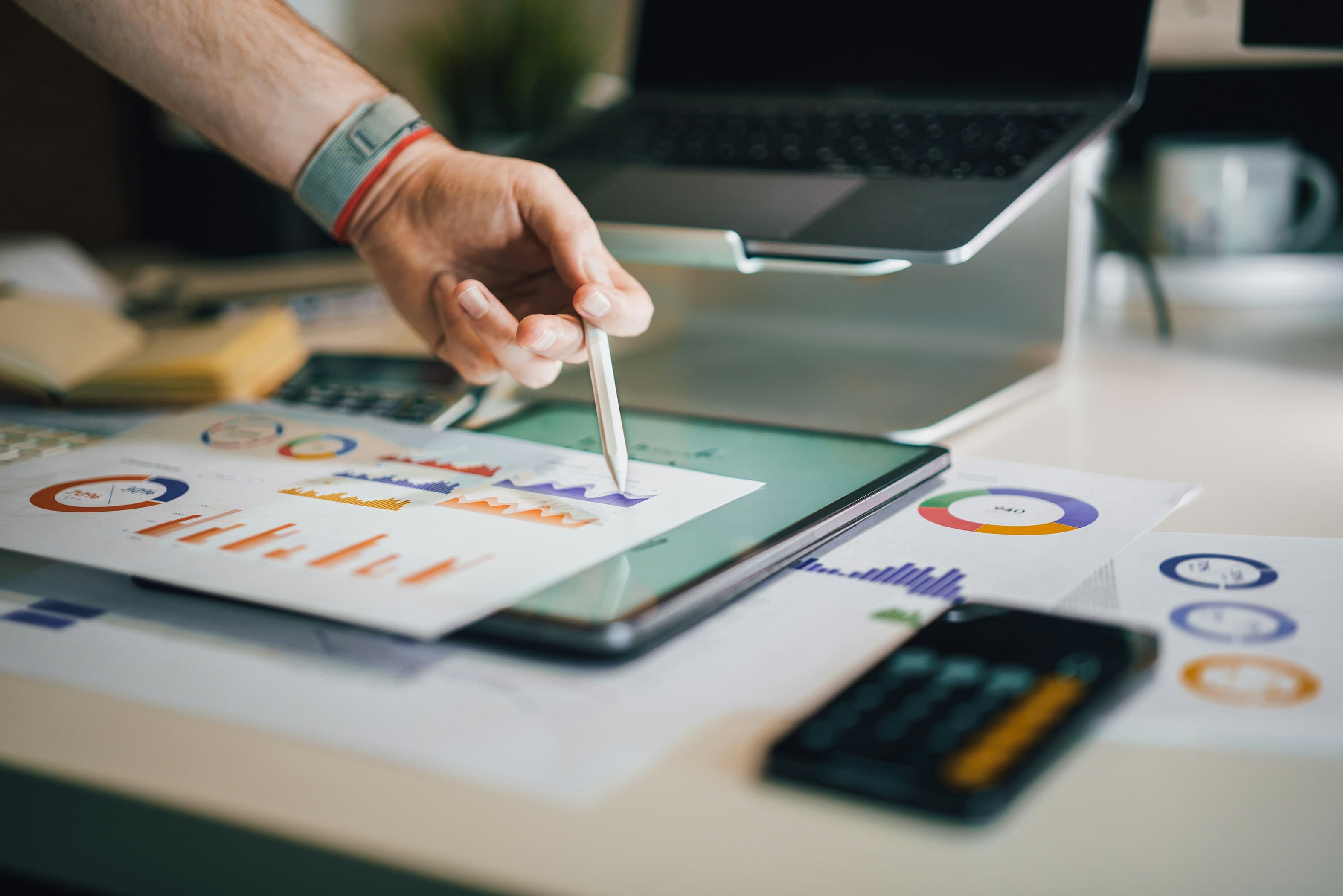 Business analytics and demand planning data on tablet