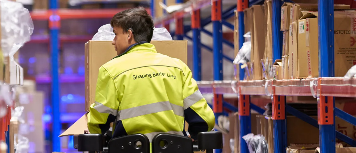 Spex warehouse operator picking an order from racking at the Canterbury facility