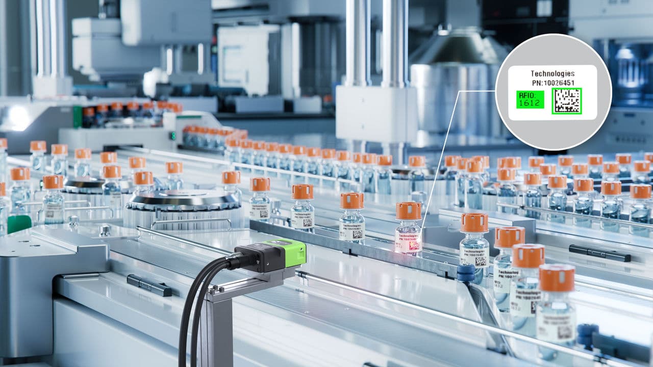 Pharmaceutical production line with Zebra FS20 fixed scanner performing OCR track-and-trace on medicine bottles
